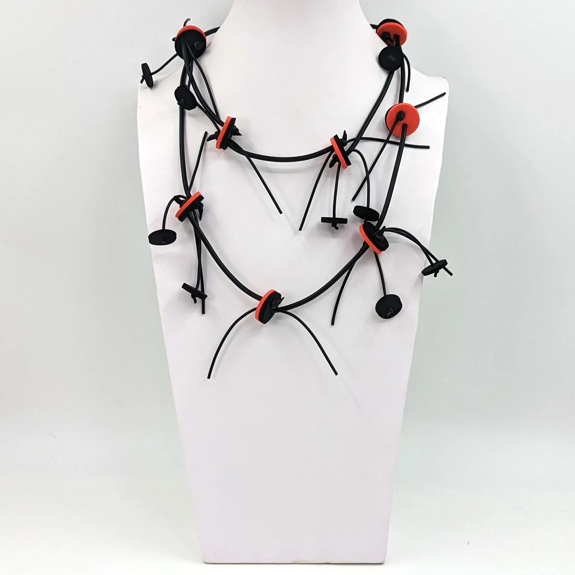 Extra long neoprene necklace with discs and strands