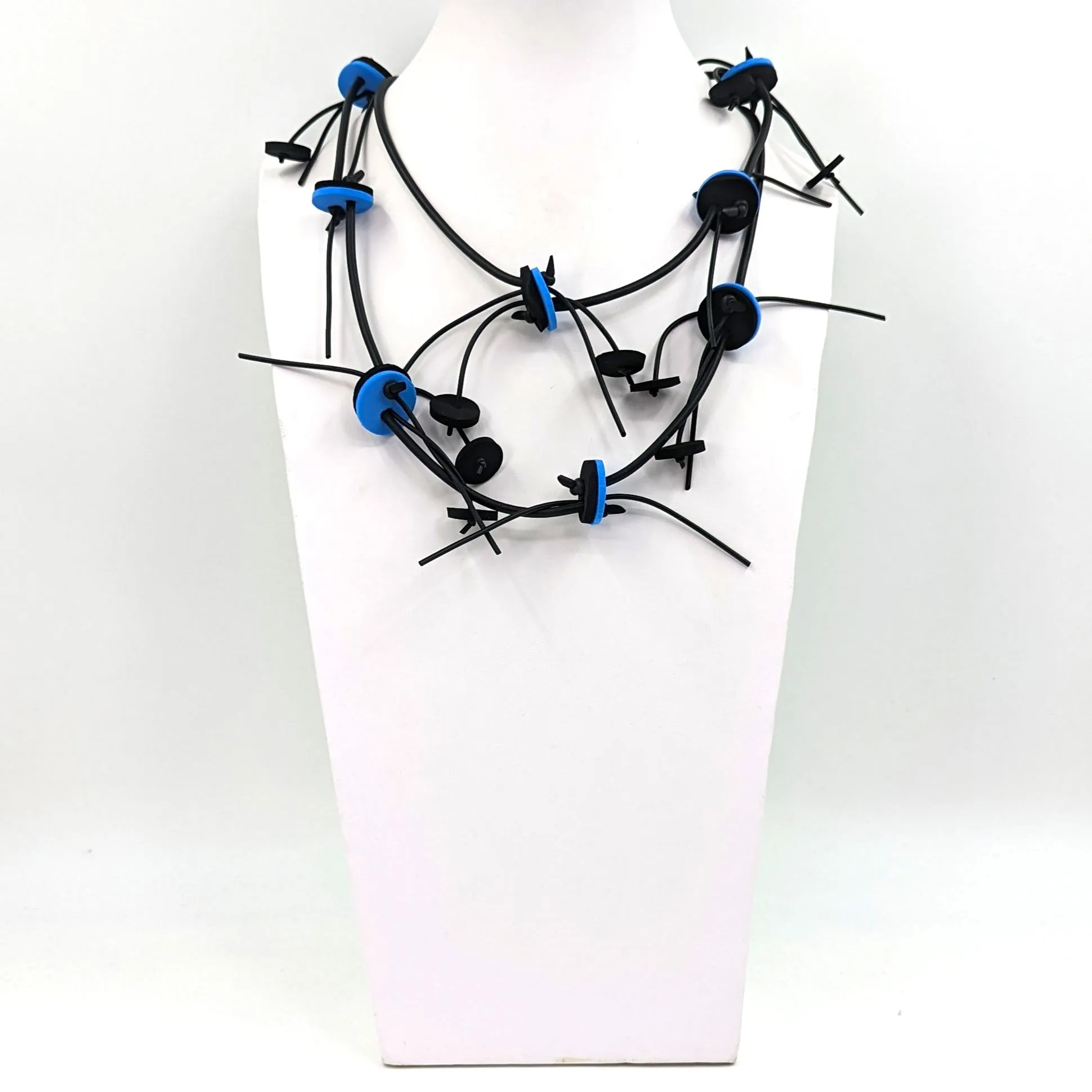 Extra long neoprene necklace with discs and strands