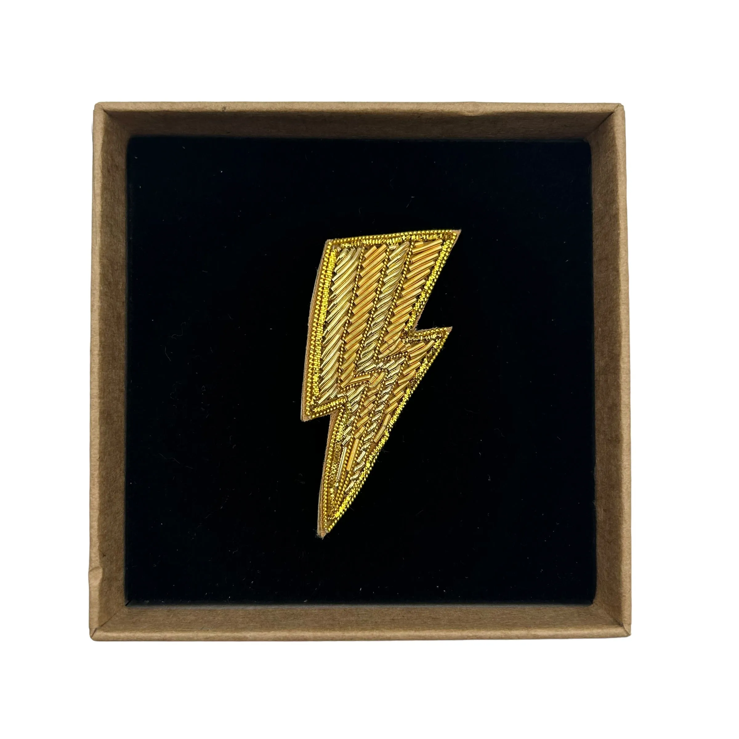 Golden lightning bolt brooch / pin