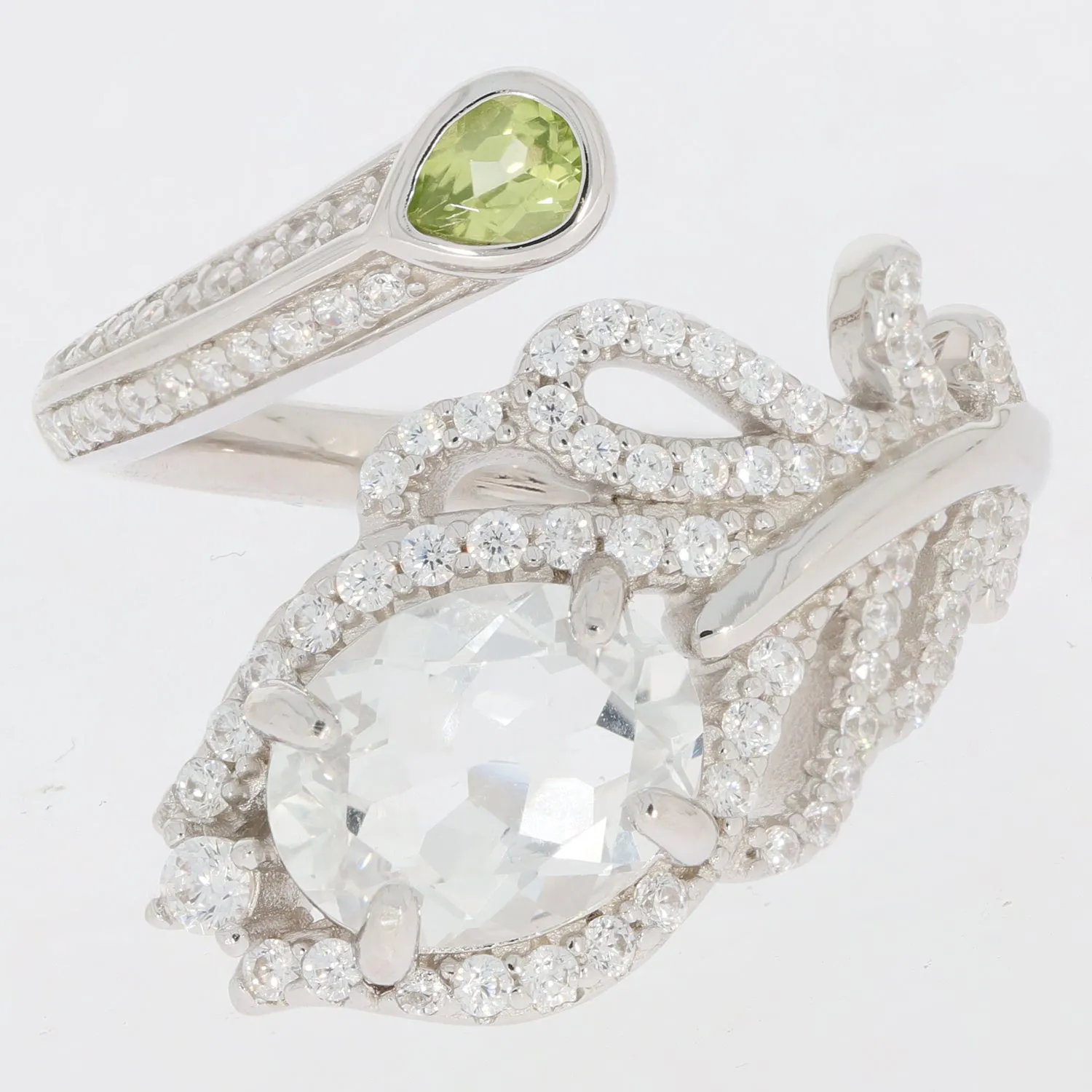 Oval Green Peridot Sterling Silver Ring with Moissanite Accent