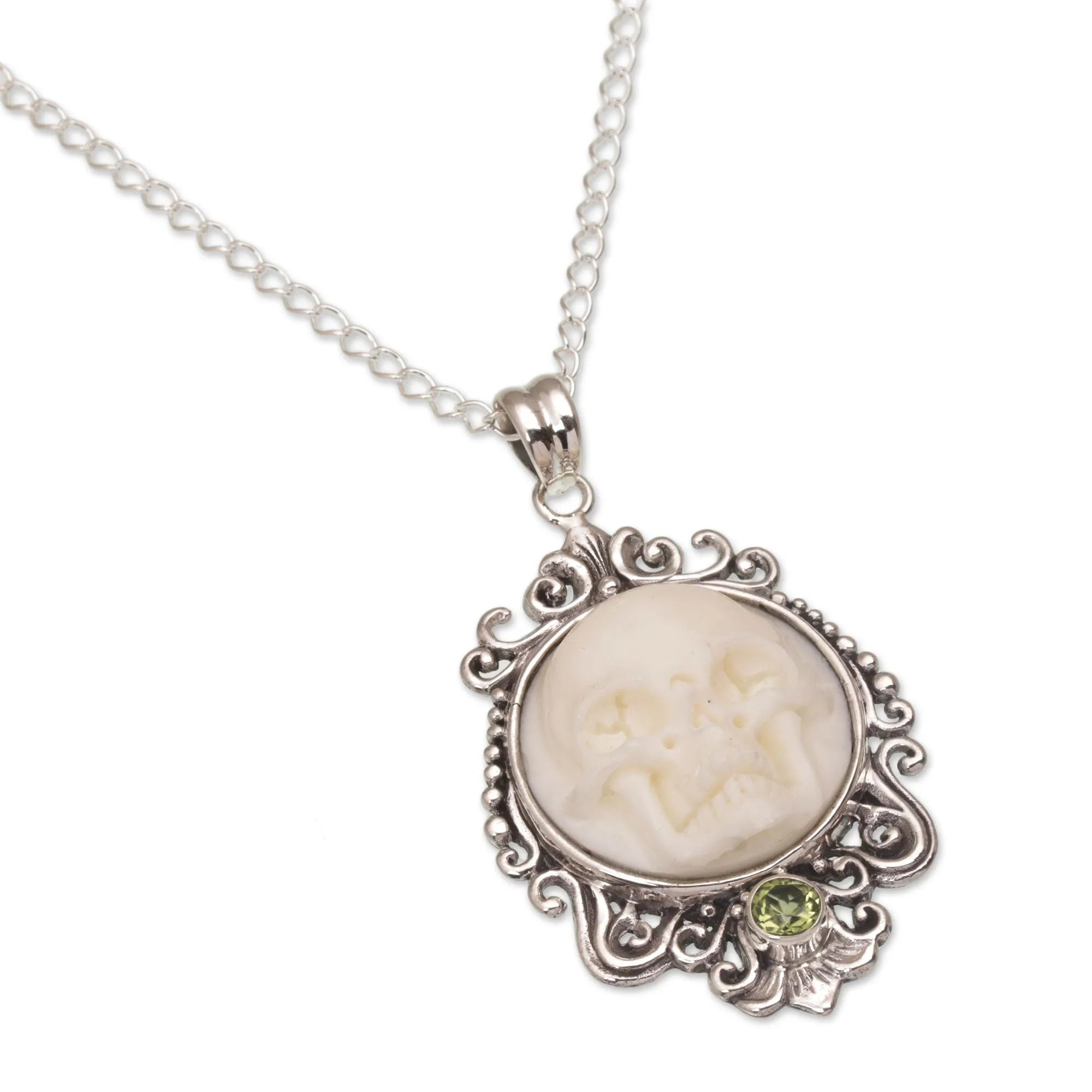 Peridot and Bone White Skull Pendant Necklace from Bali - Skull Stare in White | NOVICA
