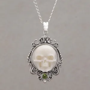 Peridot and Bone White Skull Pendant Necklace from Bali - Skull Stare in White | NOVICA