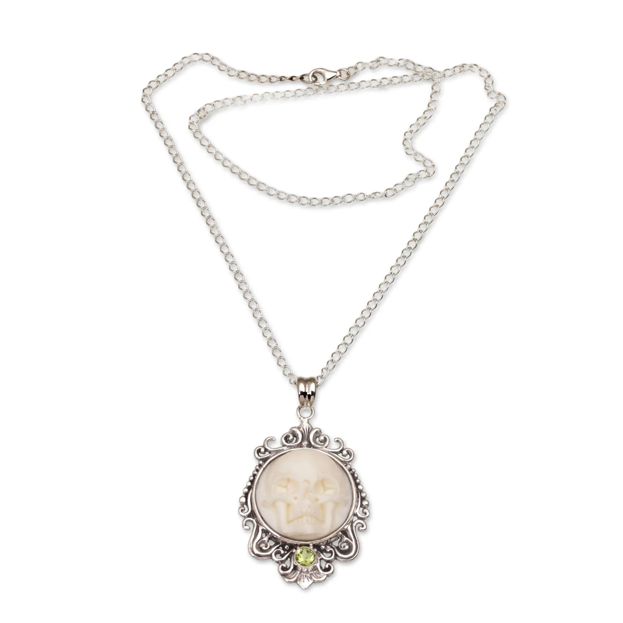 Peridot and Bone White Skull Pendant Necklace from Bali - Skull Stare in White | NOVICA